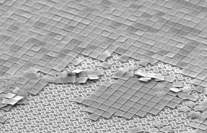 A small section of a damaged DLP chip viewed under a microscope.
